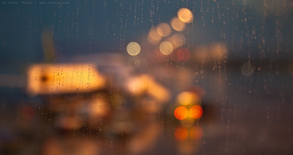 through-the-rainy-window-of-an-airport